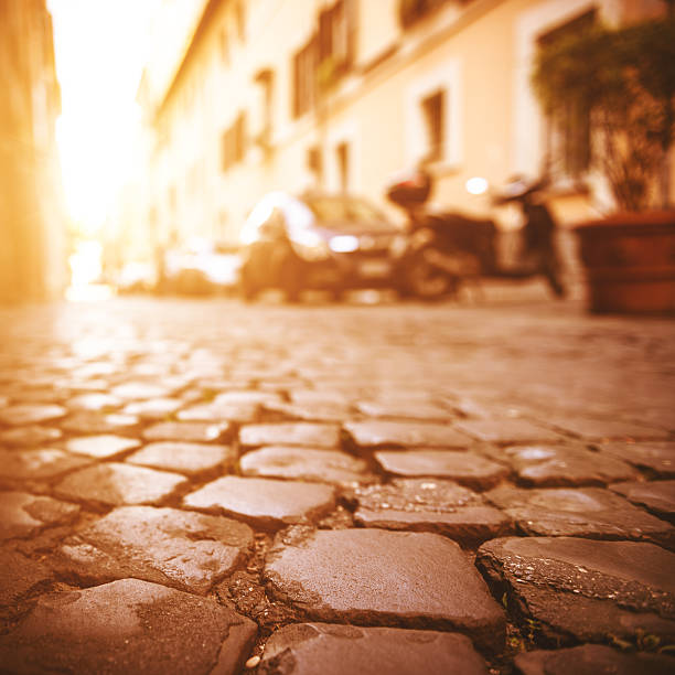 istock narrow alley in rome 187577649