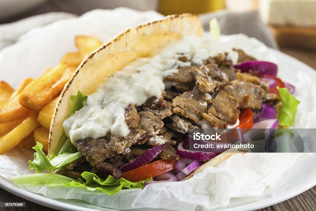 Greek Gyros with Fries and Salad Dinner Stock Photo