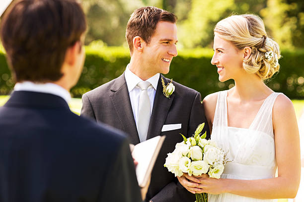 istock Couple Looking At Each Other During Garden Wedding 187579405