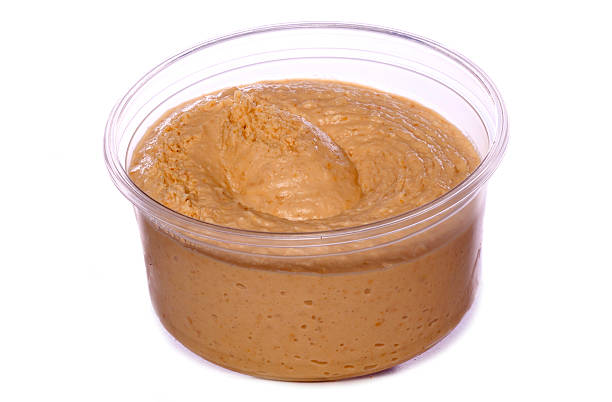 istock pot of hummus cutout 187580200