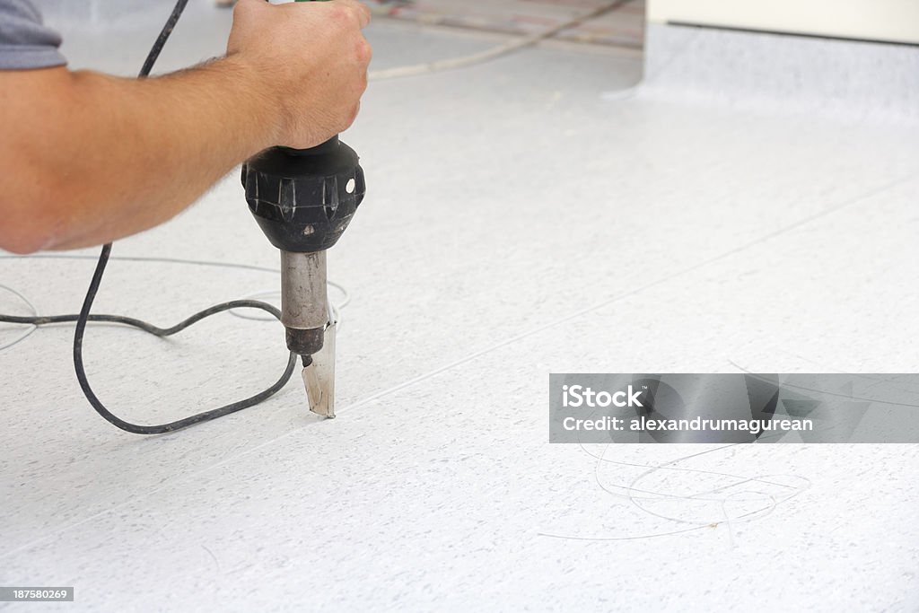 Instaling PVC Floor Welding new tarkett floor Linoleum Stock Photo