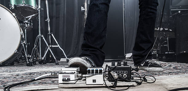 istock Guitarist using a footpedal 187580386