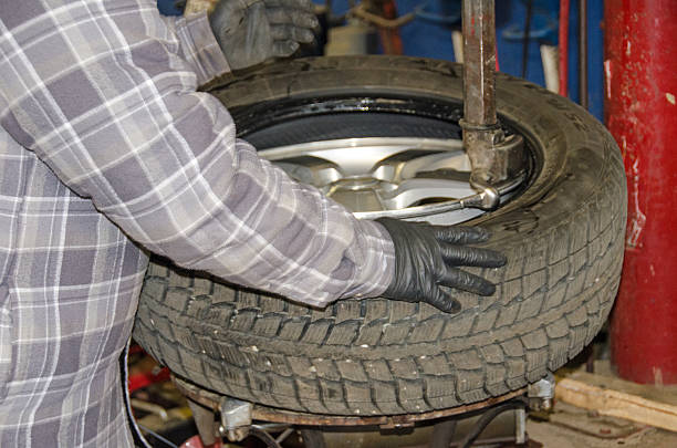istock Car Rim and Tire Change 187580398