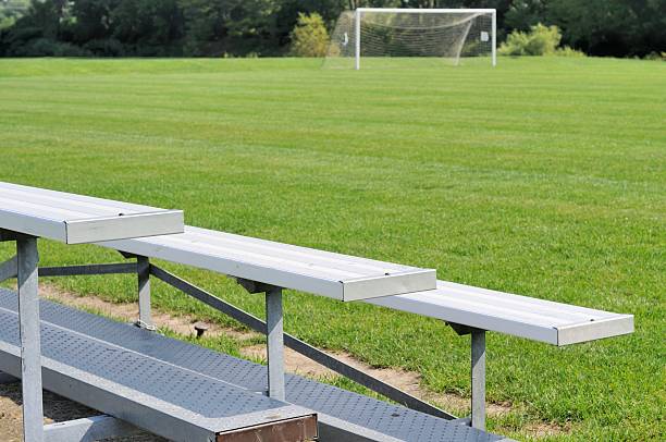 Soccer Field Bleachers and soccer goal on a sunny day. Nikon D300 (RAW) michigan football stock pictures, royalty-free photos & images