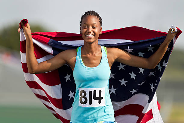 istock Runner Carrying American Flag During Victory Lap. 187581064