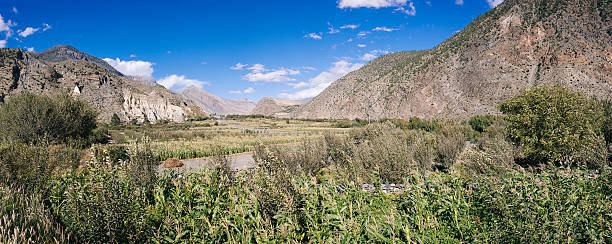 Panoramic view of agricultural field in the Himalayan region of Mustang, Nepal.