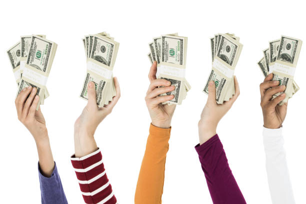istock People holding money 187581617