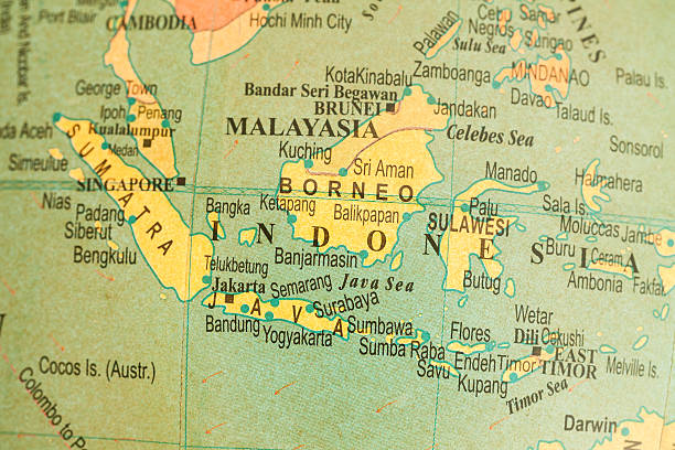 Travel The Globe Series - Indonesia Studying Geography - Indonesia on retro globe. 2004 indian ocean earthquake and tsunami stock pictures, royalty-free photos & images