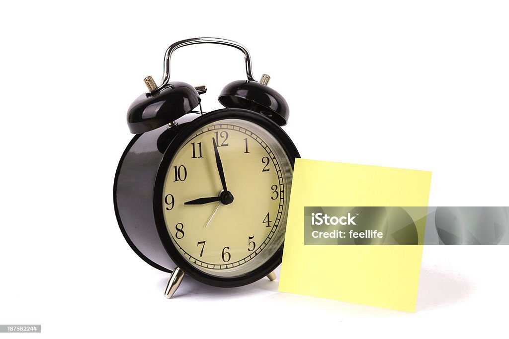 alarm clock with blank note isolated on white background Adhesive Note Stock Photo