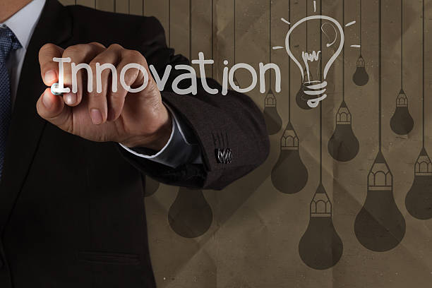 istock businessman hand draws innovation  light bulb with recycle envel 187582272