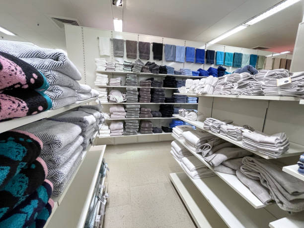 istock stack of colorful towels on shelves 1875825499