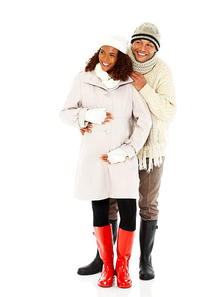 istock Beautiful pregnant couple looking away 187582887