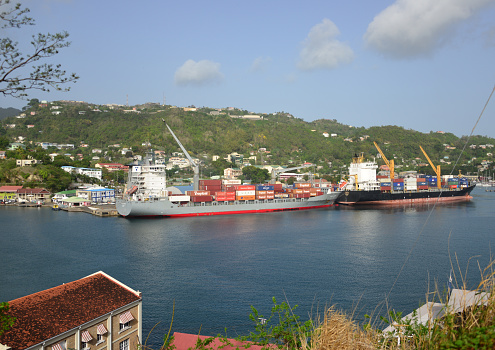 Saint George's, Grenada: view over Port of St. George's with two container ships docked, administered by the Grenada Ports Authority (GPA).