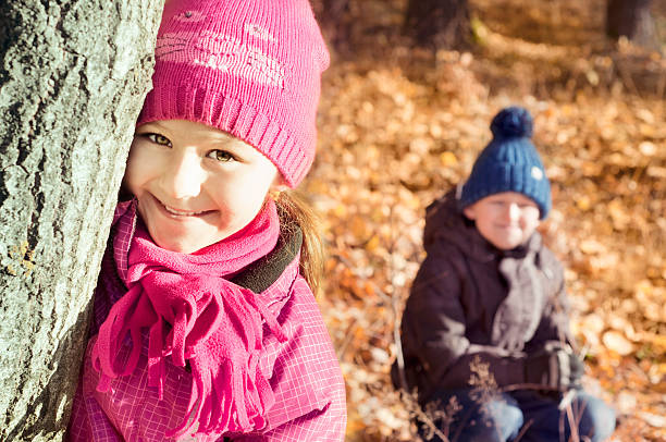 istock Children in autumn forest 187584463