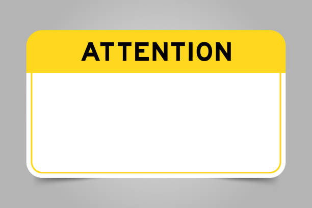 istock Label banner that have yellow headline with word attention and white copy space, on gray background 1875925606