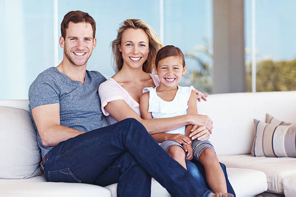 istock Relaxing at home with mom and dad 187592848