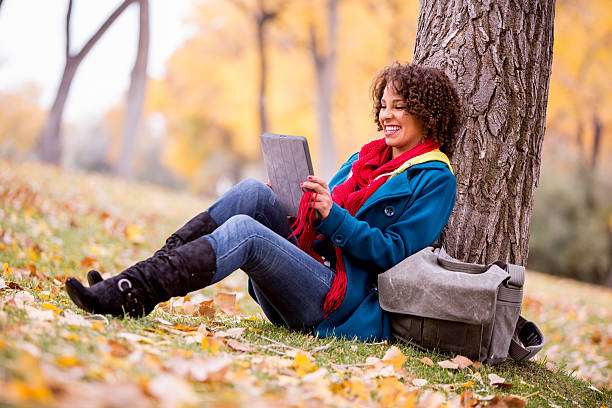 istock Young Woman with Tablet 187593672