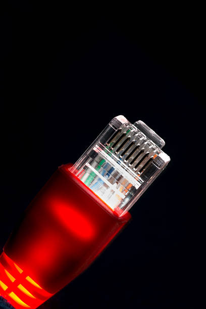 czerwony rozjarzony rj45 komputera kabla sieciowego - computer cable nobody rj45 network connection plug zdjęcia i obrazy z banku zdjęć