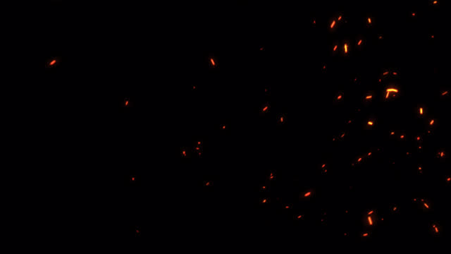 Loop glow fire particles sparks rising up on black abstract background with transparent alpha channel can be used for overlay for your project. 4K 3D animation of fiery orange glowing flying ember burning ash particles.