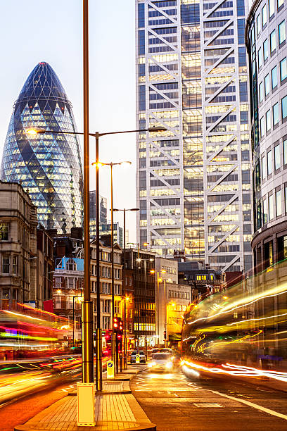 istock Double Decker Buses Traffic and Office Buildings at Dusk, London 187595464