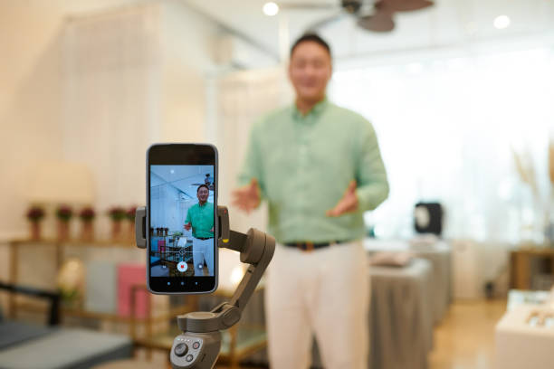 istock Smartphone Filming Talking Salon Owner 1875960519