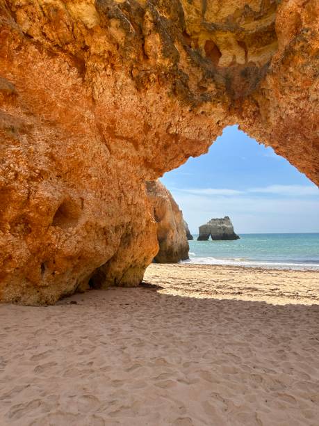 istock The Algarve: Rocky Archway on the Beach 1875964434