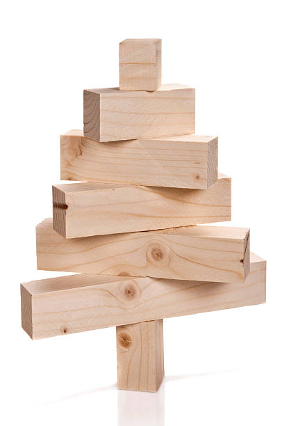 istock Stacked lumbers in the shape of a christmas tree 187596698