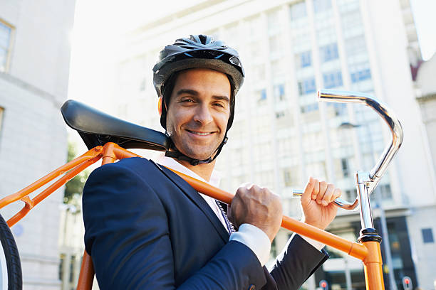 A businessman traveling by bicycle