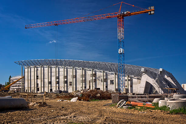 istock Tower crane over shopping center under construction 187597393