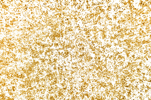 golden glitter on white background