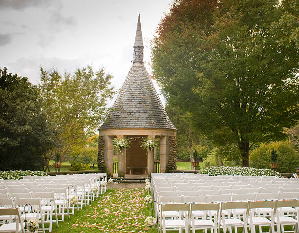 Wedding Ceremony with Stone Gazebo and Chairs