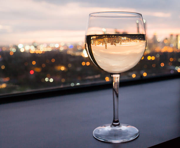 istock Glass of wine with city view 187600962