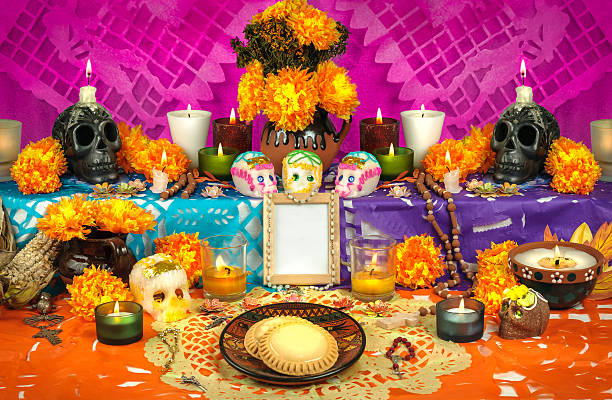 Mexican day of the dead altar (Dia de Muertos) Traditional mexican Day of the dead altar with sugar skulls and candles altar stock pictures, royalty-free photos & images