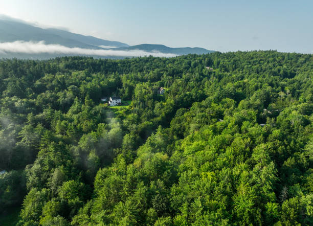 farms and houses surrounding stowe, a small town in northern vermont. - town rural scene road new england imagens e fotografias de stock