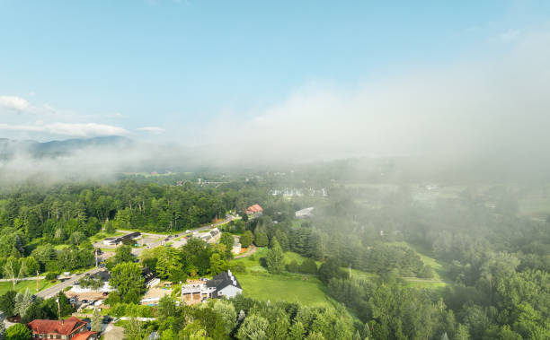 farms and houses surrounding stowe, a small town in northern vermont. - town rural scene road new england imagens e fotografias de stock