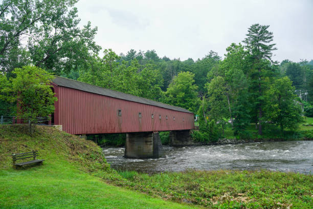 istock West Cornwall Covered Bridge. also known as Hart Bridge, is a wooden lattice truss bridge over the Housatonic River view from Sharon. 1876076048