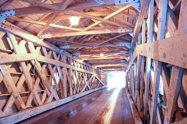 istock West Cornwall Covered Bridge. also known as Hart Bridge, is a wooden lattice truss bridge over the Housatonic River view from Sharon. 1876076550