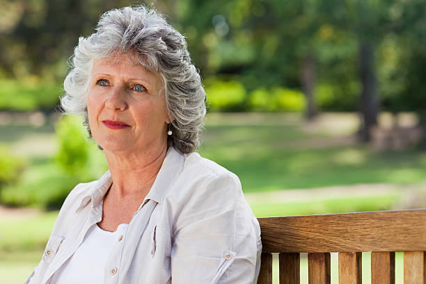 istock Old woman is thinking outdoors 187608629
