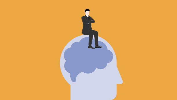 istock Confident businessman thinking and sitting with arms crossed on human brain. 1876092562