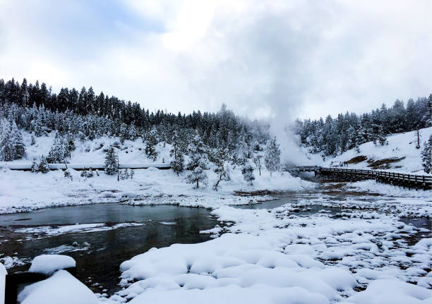 Mammoth Hot Springs in Winter in Yellowstone National Park, Wyoming Montana. Northwest. Yellowstone is a winter wonderland. Geothermal Mammoth Hot Springs in Winter in Yellowstone National Park, Wyoming Montana. Northwest. Yellowstone is a winter wonderland, to watch the wildlife and natural landscape. Geothermal mud volcano yellowstone stock pictures, royalty-free photos & images