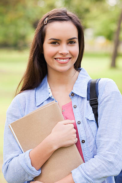 istock Portrait of a cute student smiling 187611273