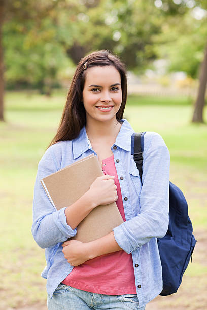 istock Portrait of a smiling female student 187611280