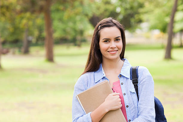 istock Portrait of a female student smiling 187611297