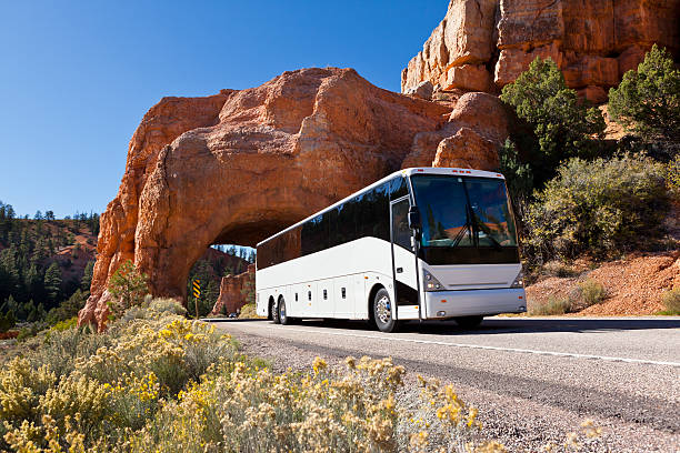 Bus driving through tunel Bryce Canyon USA stock photo