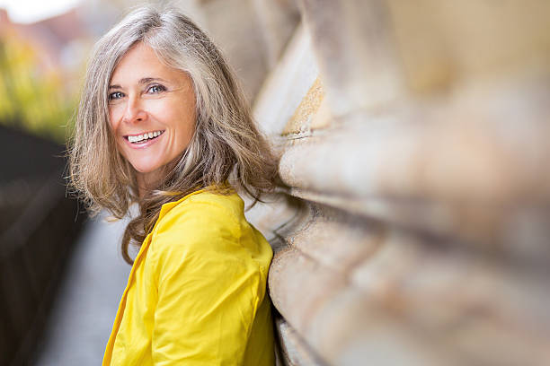 Happy Smiling Mature Woman Portrait Of Happy Woman Looking At Camera white hair stock pictures, royalty-free photos & images