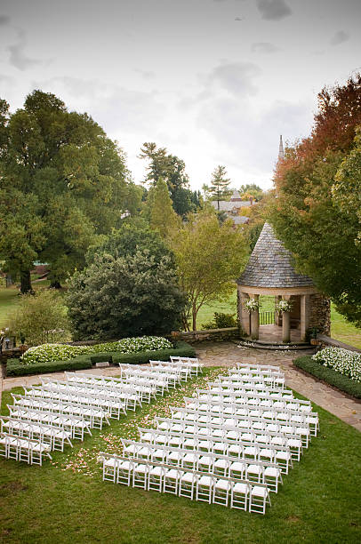 istock Wedding Ceremony with Stone Gazebo and Chairs 187614539