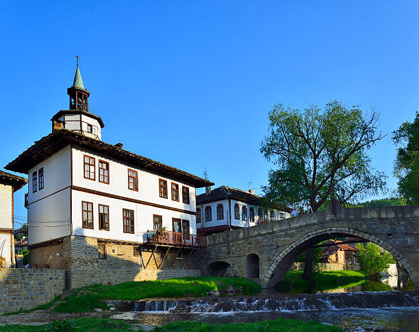 Old houses in Tryavna Old houses and clock tower, stone bridge and river in Tryavna, Bulgaria, Balkans, Eastern Europe. bulgarian culture bulgaria bridge river stock pictures, royalty-free photos & images