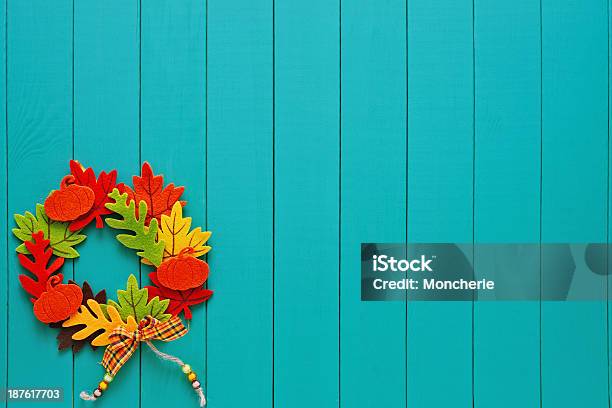 Autumn Wreath With A Pump Copy Space On Turquoise Woods Stock Photo - Download Image Now