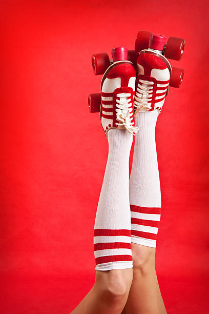 Christmas surreal collage with women legs in red tights and warm winter socks with reindeer ears fallen into magic hole with Xmas wreath.