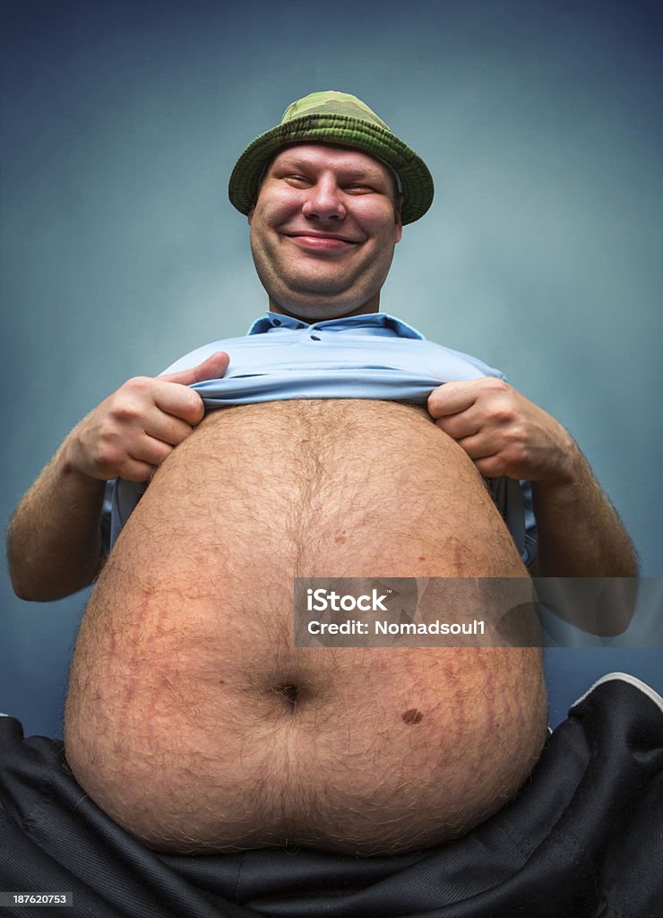 Very fat man Very fat man demonstrate his big belly Abdomen Stock Photo